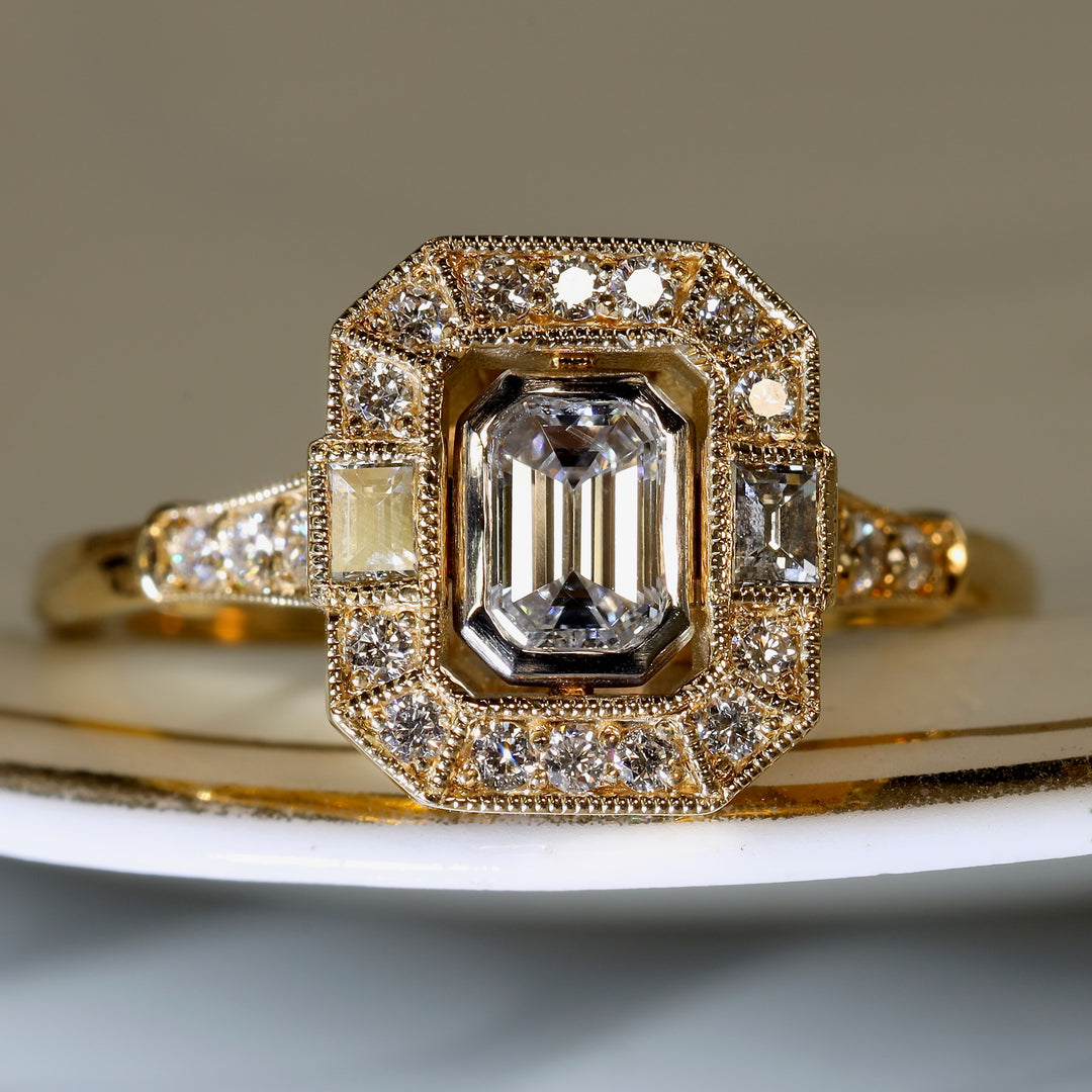 Art Deco Emerald Cut Diamond Halo Ring